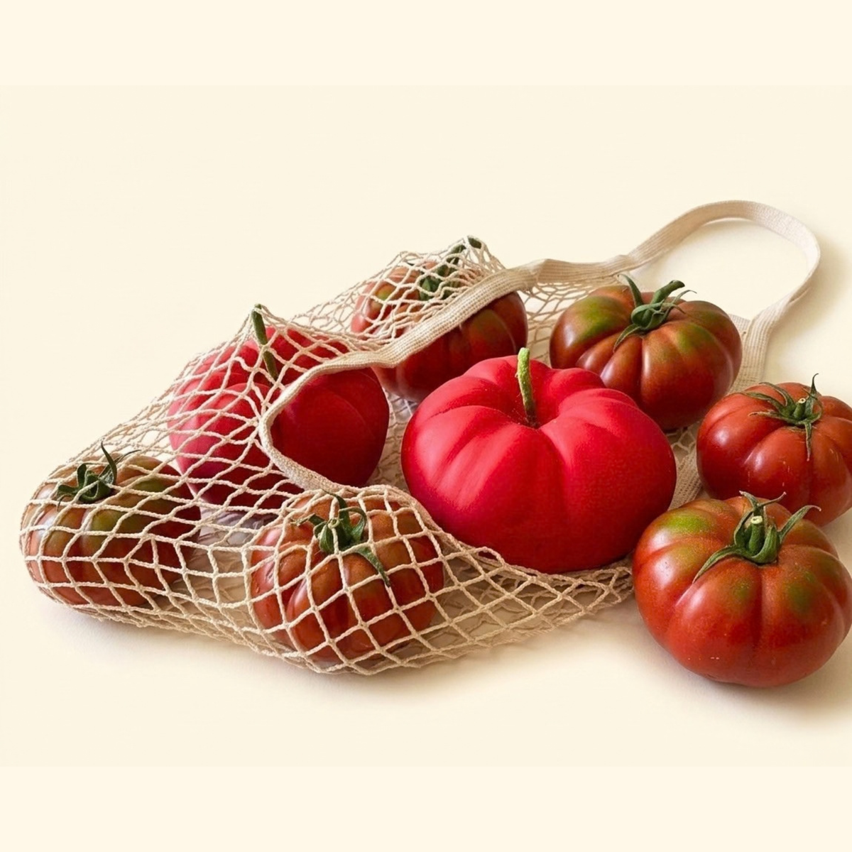 candele pomodori nella rete